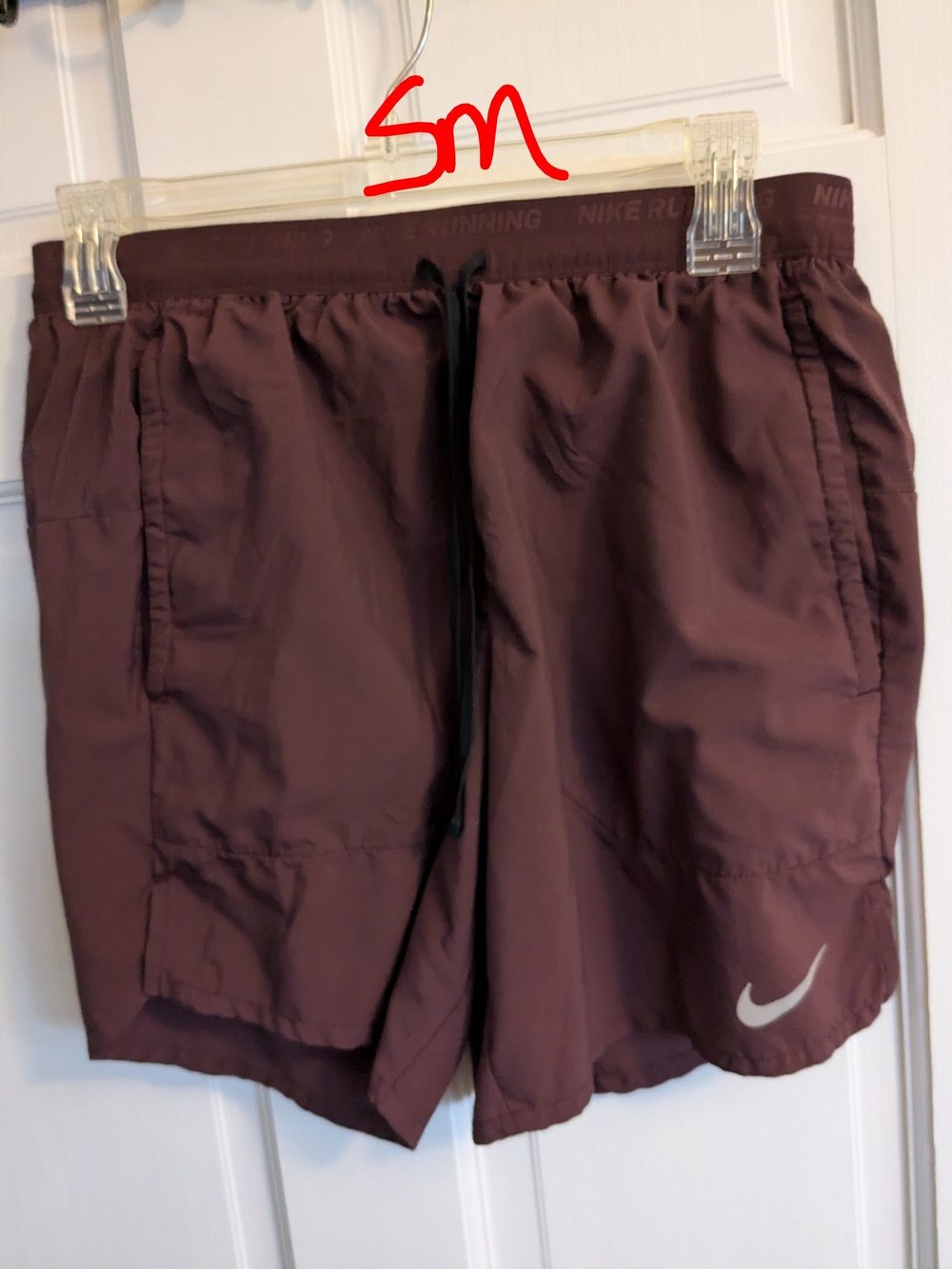 Nike Women's Plum Athletic Shorts with Reflective Swoosh